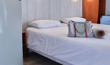 afbeelding van Standard Quadruple Room-2 Queen Beds and 1 Twin Bunk Bed Non Refundable Free valet parking Free WiFi