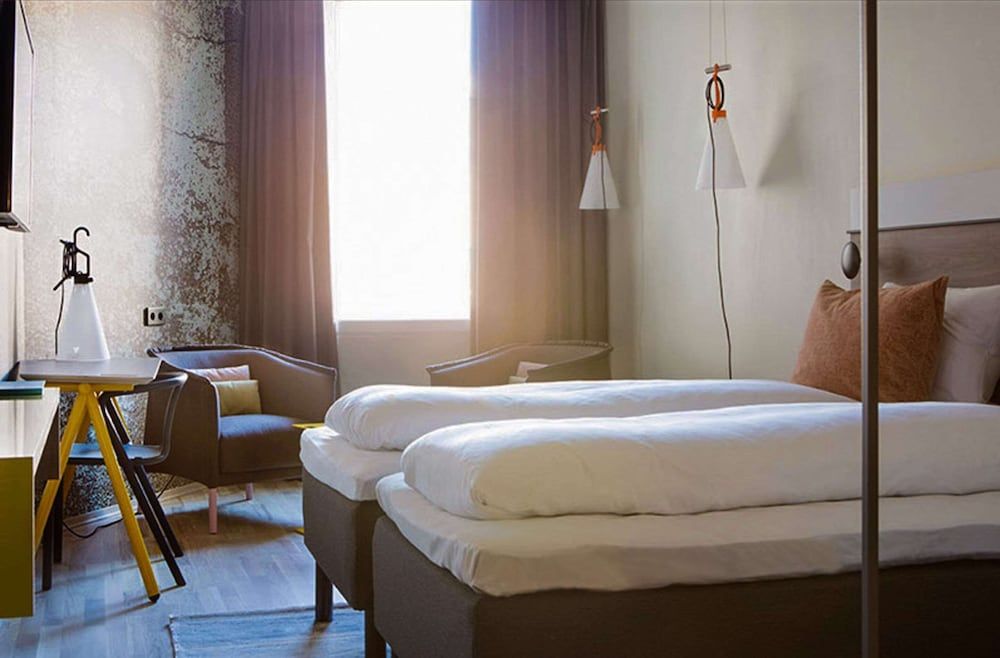 afbeelding van Standaard kamer, meerdere bedden, niet-roken (2 Single and 2 Person Sofa Bed)