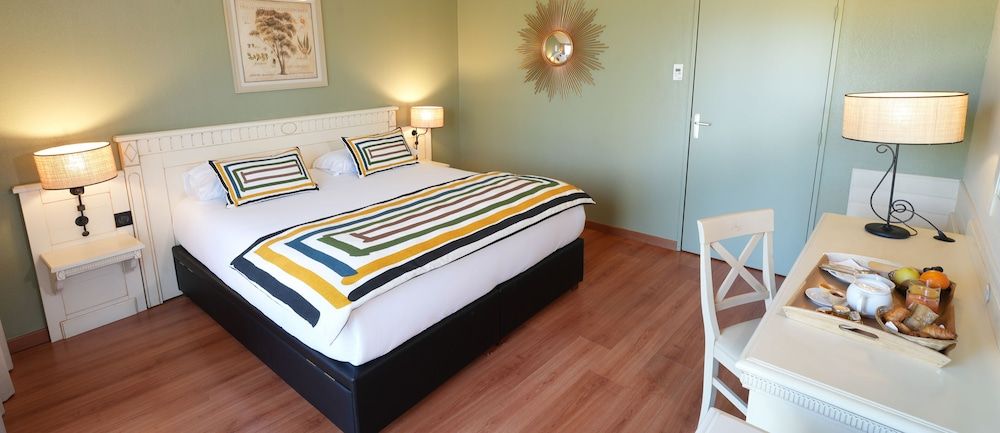 afbeelding van Deluxe kamer, 1 twee- of 2 eenpersoonsbedden, terras, uitzicht op tuin