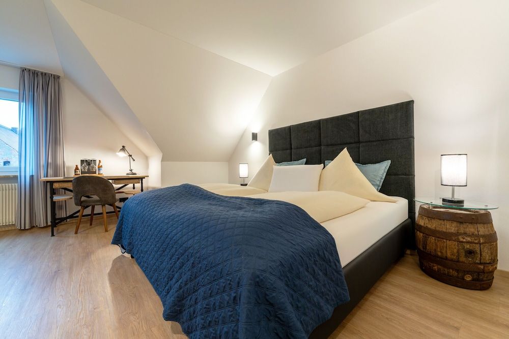 afbeelding van Deluxe tweepersoonskamer, 1 queensize bed met slaapbank, uitzicht op stad