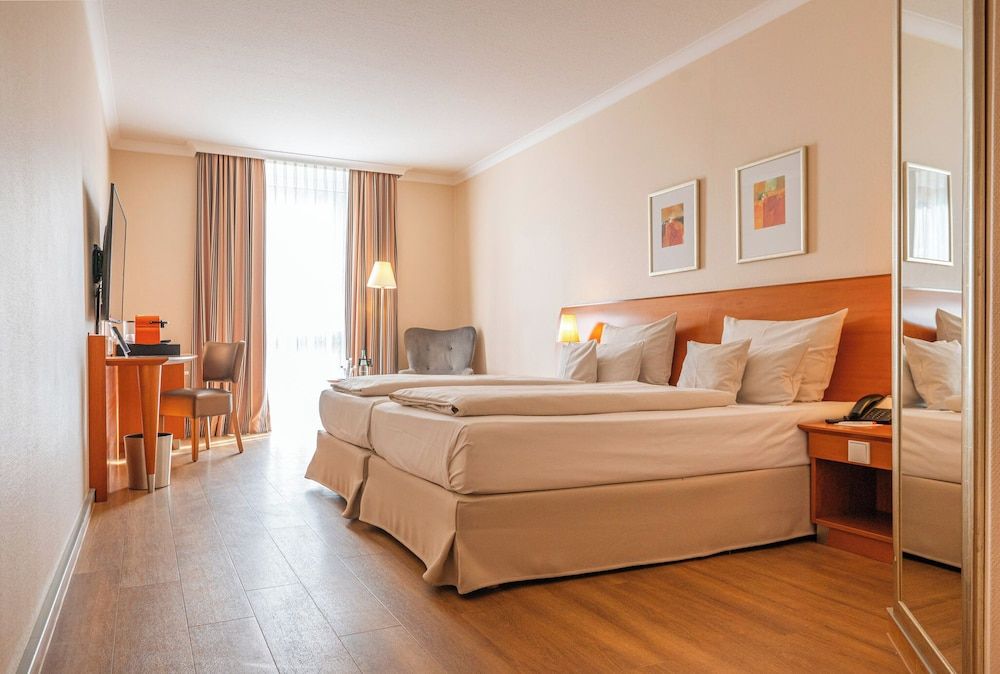 afbeelding van Comfort kamer, 2 eenpersoonsbedden, uitzicht op tuin