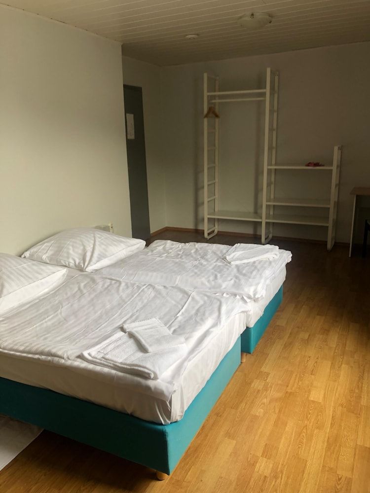 afbeelding van Eenvoudige tweepersoonskamer, gedeelde badkamer (11)
