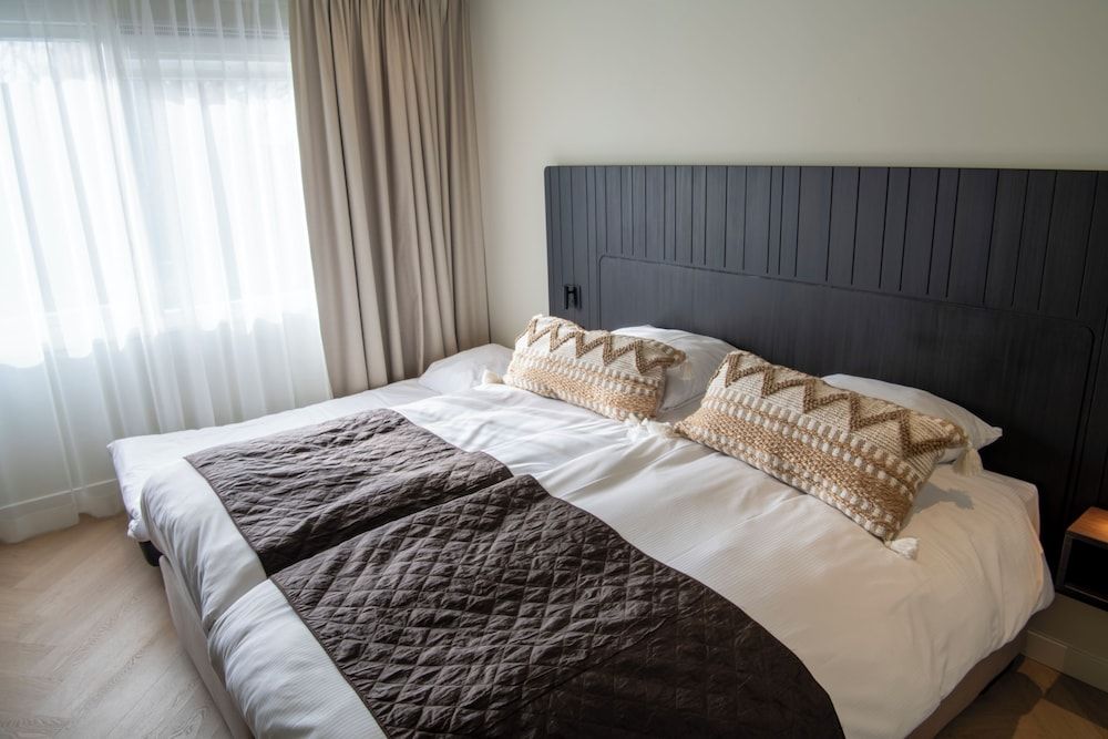 afbeelding van Deluxe driepersoonskamer, 3 eenpersoonsbedden