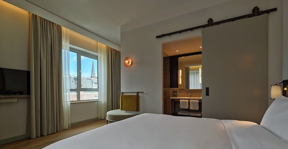 afbeelding van Suite, 1 kingsize bed met slaapbank