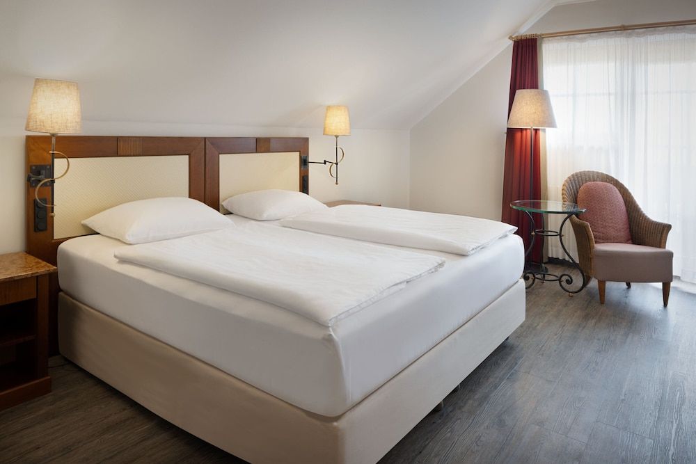 afbeelding van Suite, 1 kingsize bed met slaapbank, uitzicht op tuin (Balcony)